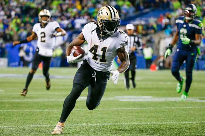 Oct 25, 2021; New Orleans Saints running back Alvin Kamara (41) scores on a touchdown reception against the Seattle Seahawks. Mandatory Credit: Joe Nicholson-USA TODAY Sports